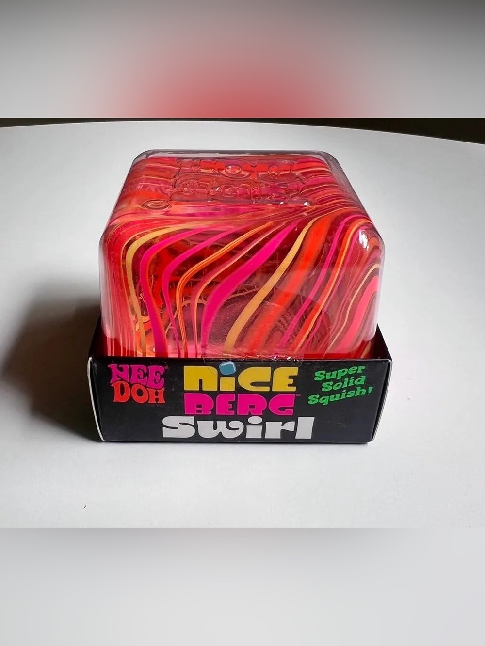 Nee Doh Nice Berg Swirl Super Solid Squish - Orange Pink Swirl